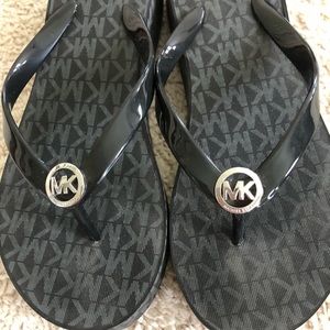 Michael Kors Authentic black flip flops